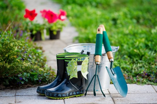 Technician using advanced mower on Muswell Hill lawn